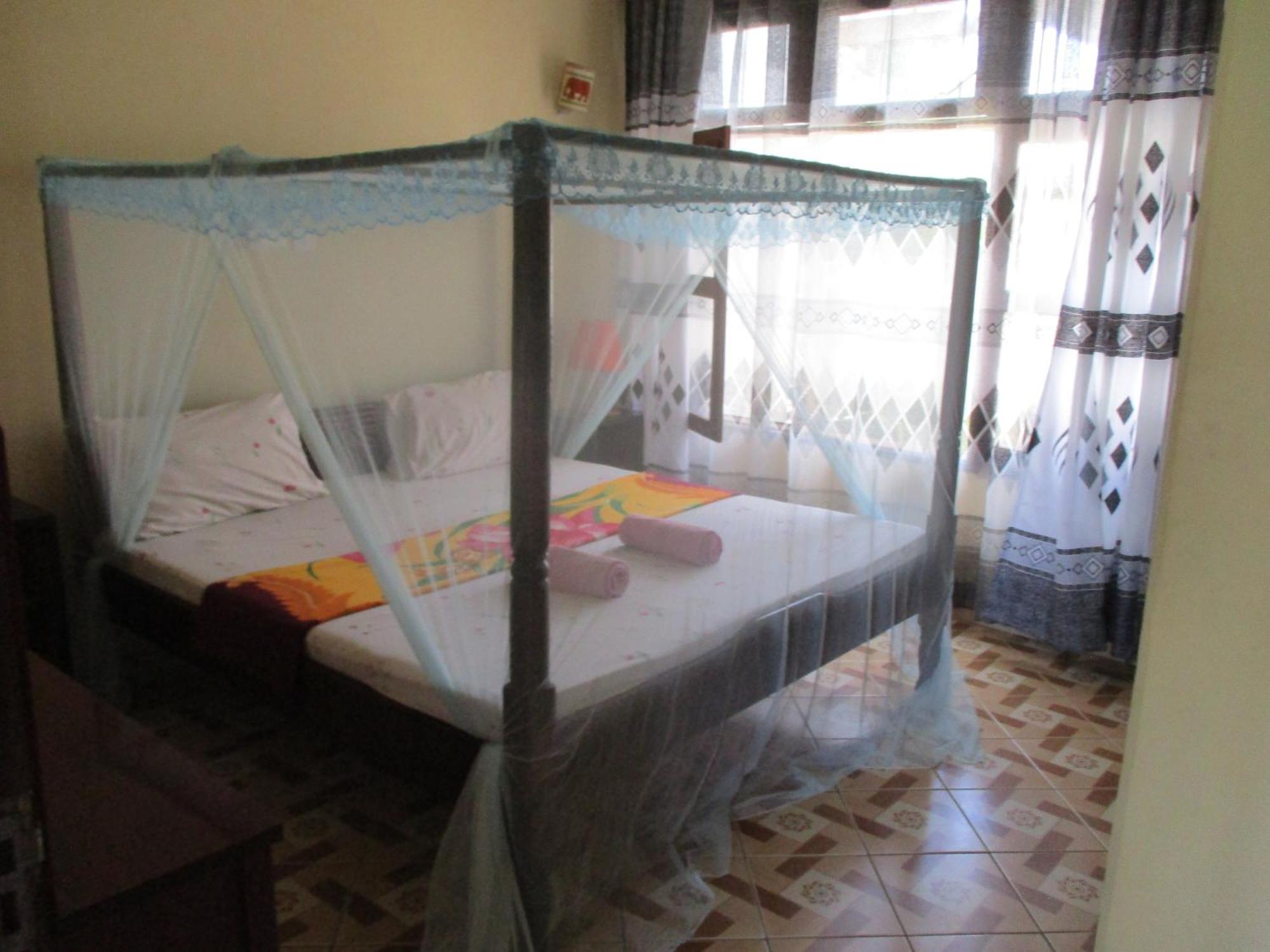 Simba Apartments Diani Beach Room photo